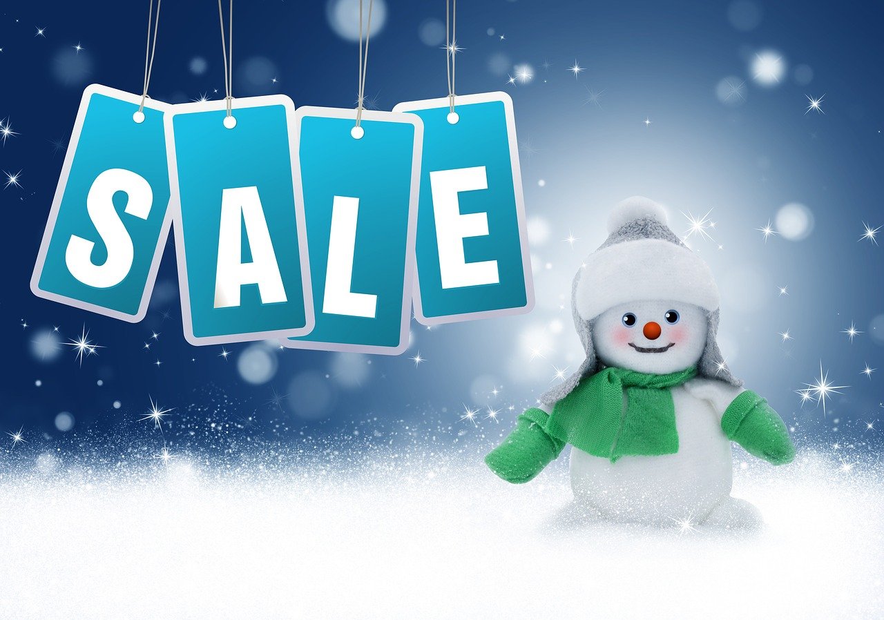 Picture of snowman with sale sign